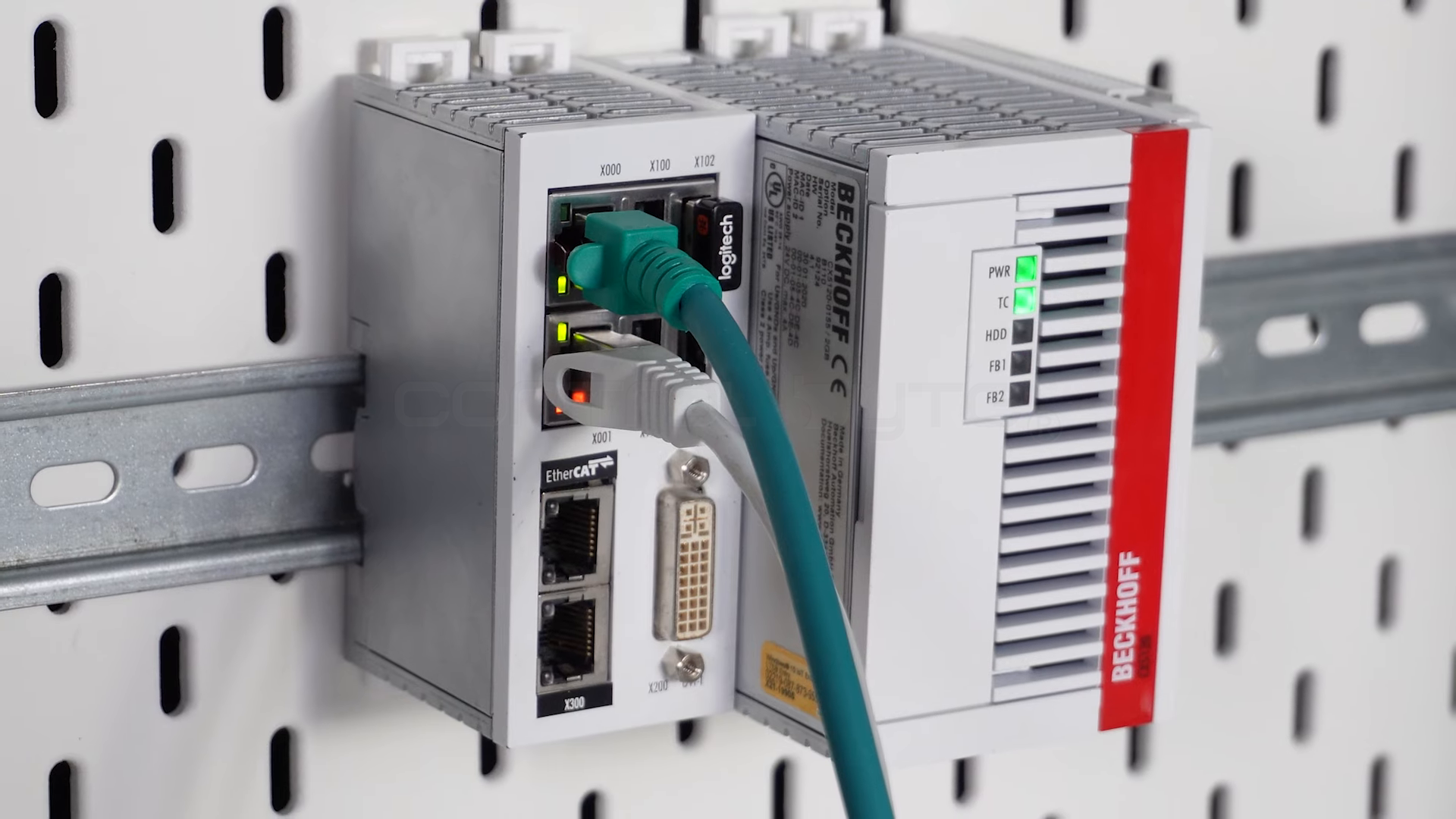 Beckhoff PLC controller (Embedded PC) with an EtherCAT interface on a DIN rail, used to build a TwinCAT 3 project.